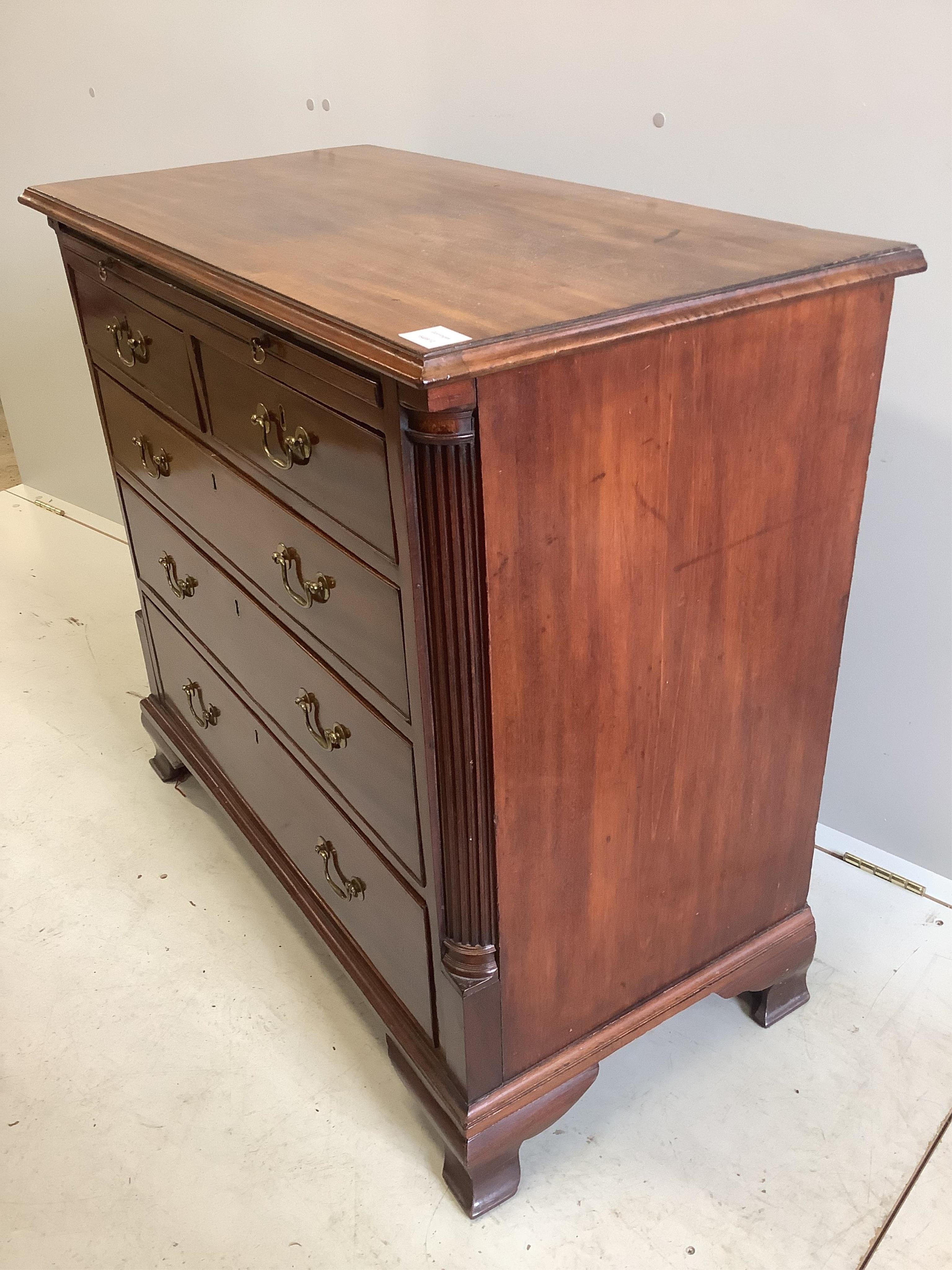 A George III mahogany chest of drawers with brushing slide, width 33cm, depth 47cm, height 85cm. Condition - good